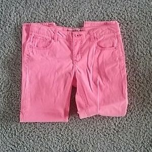 Neon pink skinny jeans